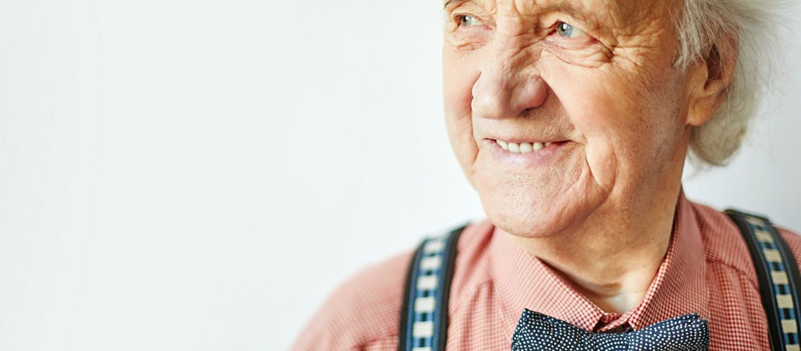 Senior man happy to be of medicare enrollement age.